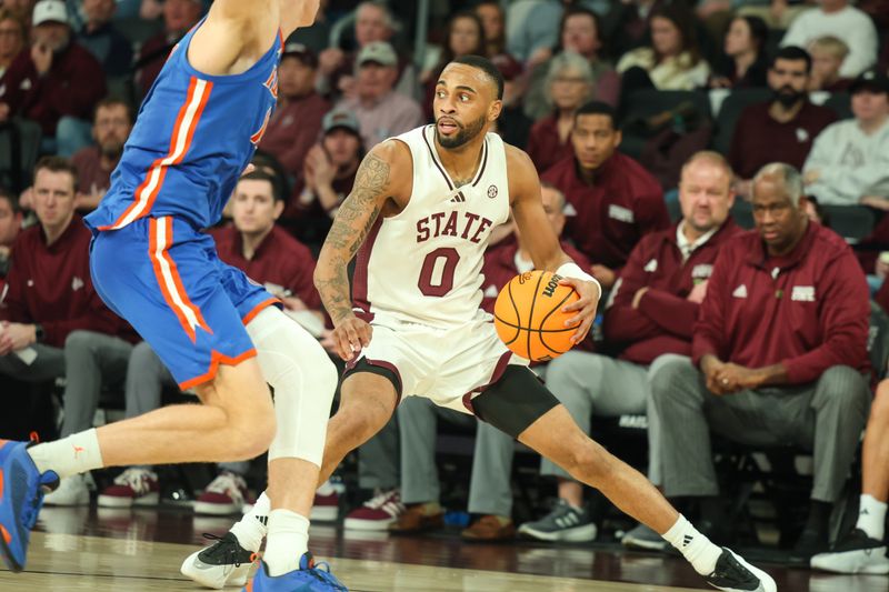 Feb 11, 2025; Starkville, Mississippi, USA; Mississippi State Bulldogs guard Claudell Harris Jr. (0) looks to pass the ball against the Florida Gators during the second half at Humphrey Coliseum. Mandatory Credit: Wesley Hale-Imagn Images