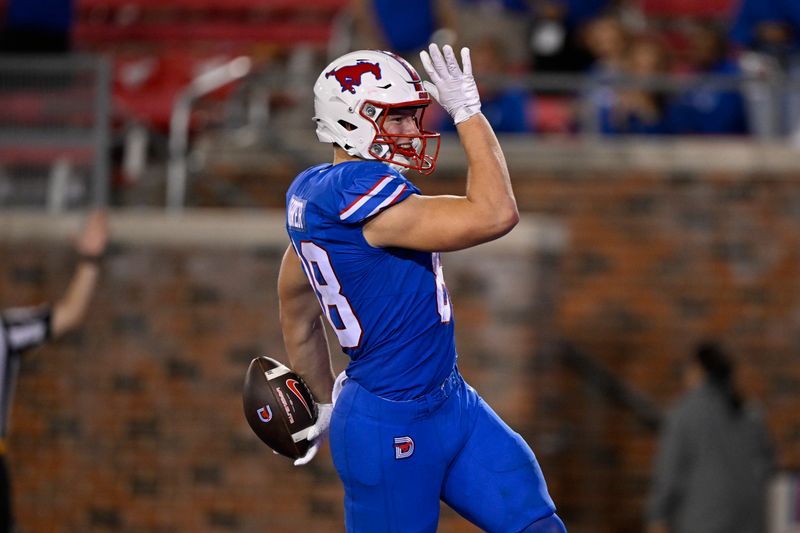 Nov 2, 2024; Dallas, Texas, USA; Southern Methodist Mustangs tight end Matthew Hibner (88) celebrates after he scores a touchdown against the Pittsburgh Panthers during the second half at Gerald J. Ford Stadium. Mandatory Credit: Jerome Miron-Imagn Images