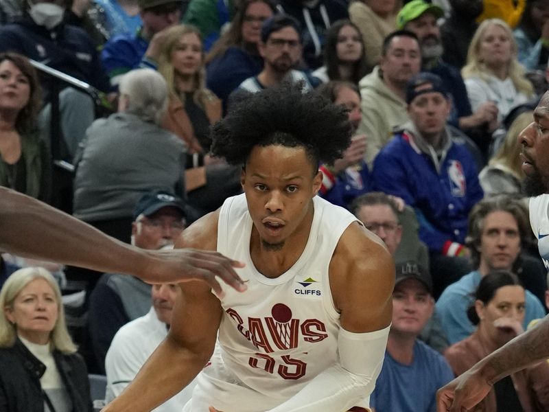 MINNEAPOLIS, MN -  MARCH 22:  Isaac Okoro #35 of the Cleveland Cavaliers handles the ball during the game against the Minnesota Timberwolves on March 22, 2024 at Target Center in Minneapolis, Minnesota. NOTE TO USER: User expressly acknowledges and agrees that, by downloading and or using this Photograph, user is consenting to the terms and conditions of the Getty Images License Agreement. Mandatory Copyright Notice: Copyright 2024 NBAE (Photo by Jordan Johnson/NBAE via Getty Images)