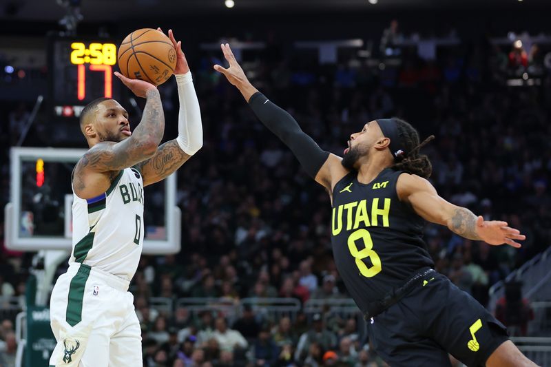 MILWAUKEE, WISCONSIN - NOVEMBER 07: Damian Lillard #0 of the Milwaukee Bucks shoots over Patty Mills #8 of the Utah Jazz during the first half of a game at Fiserv Forum on November 07, 2024 in Milwaukee, Wisconsin.  NOTE TO USER: User expressly acknowledges and agrees that, by downloading and or using this photograph, User is consenting to the terms and conditions of the Getty Images License Agreement. (Photo by Stacy Revere/Getty Images)