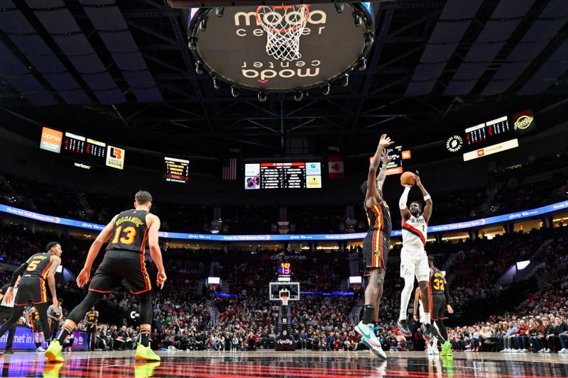 PORTLAND, OREGON - MARCH 13: Deandre Ayton #2 of the Portland Trail Blazers shoots a jumper during the first quarter of the game against the Atlanta Hawks at the Moda Center on March 13, 2024 in Portland, Oregon. The Portland Trail Blazers won 106-102. NOTE TO USER: User expressly acknowledges and agrees that, by downloading and or using this photograph, User is consenting to the terms and conditions of the Getty Images License Agreement. (Photo by Alika Jenner/Getty Images)