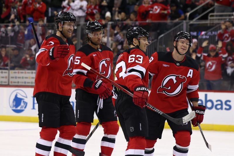 Dec 6, 2024; Newark, New Jersey, USA; New Jersey Devils left wing Jesper Bratt (63) celebrates his goal against the Seattle Kraken during the second period at Prudential Center. Mandatory Credit: Ed Mulholland-Imagn Images