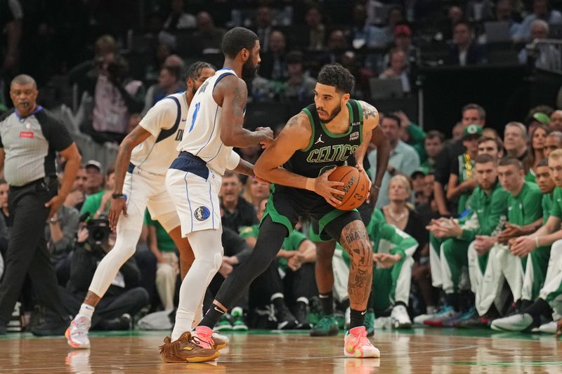 BOSTON, MA - JUNE 9: Jayson Tatum #0 of the Boston Celtics looks to pass the ball during the game against the Dallas Mavericks during Game 2 of the 2024 NBA Finals on June 9, 2024 at the TD Garden in Boston, Massachusetts. NOTE TO USER: User expressly acknowledges and agrees that, by downloading and or using this photograph, User is consenting to the terms and conditions of the Getty Images License Agreement. Mandatory Copyright Notice: Copyright 2024 NBAE  (Photo by Jesse D. Garrabrant/NBAE via Getty Images)