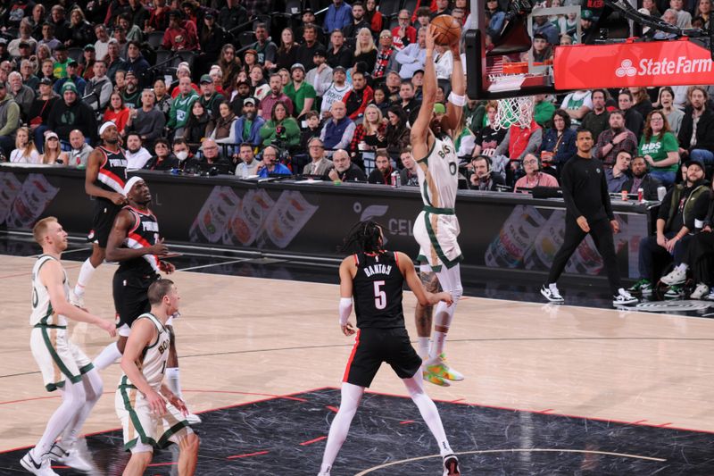 PORTLAND, OR - MARCH 11: Jayson Tatum #0 of the Boston Celtics drives to the basket during the game against the Portland Trail Blazers on March 11, 2024 at the Moda Center Arena in Portland, Oregon. NOTE TO USER: User expressly acknowledges and agrees that, by downloading and or using this photograph, user is consenting to the terms and conditions of the Getty Images License Agreement. Mandatory Copyright Notice: Copyright 2024 NBAE (Photo by Cameron Browne/NBAE via Getty Images)