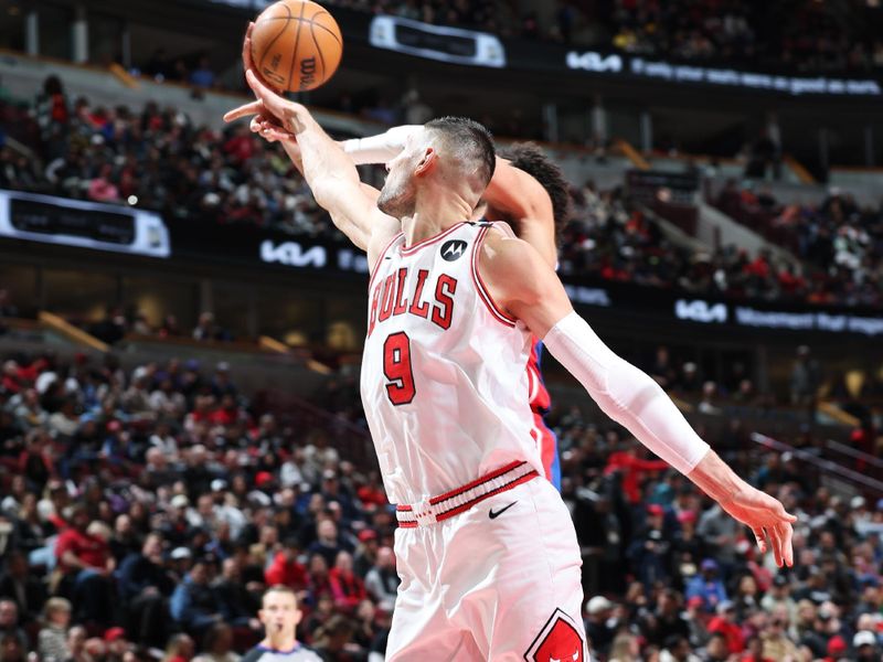 CHICAGO, IL - FEBRUARY 11:  Nikola Vucevic #9 of the Chicago Bulls catches the ball during the game against the Detroit Pistons on February 11, 2025 at United Center in Chicago, Illinois. NOTE TO USER: User expressly acknowledges and agrees that, by downloading and or using this photograph, User is consenting to the terms and conditions of the Getty Images License Agreement. Mandatory Copyright Notice: Copyright 2025 NBAE (Photo by Jeff Haynes/NBAE via Getty Images)