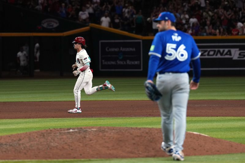 Jul 13, 2024; Phoenix, Arizona, USA; Arizona Diamondbacks outfielder Corbin Carroll (7) runs the bases after hitting a three run home run against Toronto Blue Jays pitcher Zach Pop (56) during the seventh inning at Chase Field. Mandatory Credit: Joe Camporeale-USA TODAY Sports
