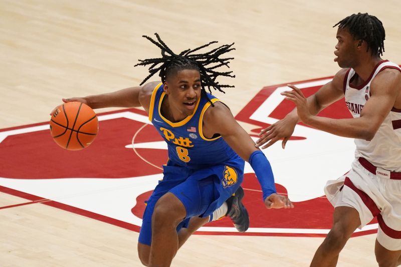 Feb 25, 2026; Stanford, California, USA;  Pittsburgh Panthers guard Omari Witherspoon (8) is defended by Stanford Cardinal guard Ebuka Okorie (1) in the first half at Maples Pavilion. Mandatory Credit: David Gonzales-Imagn Images