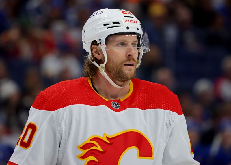 Oct 19, 2023; Buffalo, New York, USA;  Calgary Flames center Blake Coleman (20) waits for the face-off during the first period against the Buffalo Sabres at KeyBank Center. Mandatory Credit: Timothy T. Ludwig-USA TODAY Sports