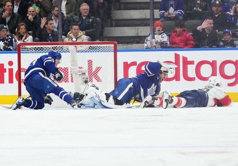 Nov 28, 2023; Toronto, Ontario, CAN; Florida Panthers left wing Matthew Tkachuk (19) runs into Toronto Maple Leafs goaltender Joseph Woll (60) during the third period at Scotiabank Arena. Mandatory Credit: Nick Turchiaro-USA TODAY Sports