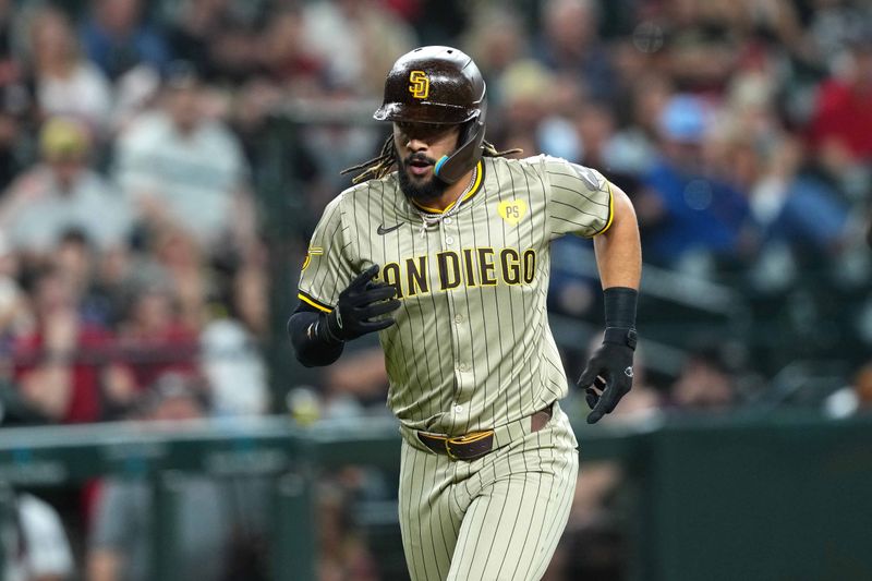 May 3, 2024; Phoenix, Arizona, USA; San Diego Padres outfielder Fernando Tatis Jr. (23) runs the bases after hitting a home run against the Arizona Diamondbacks during the fourth inning at Chase Field. Mandatory Credit: Joe Camporeale-USA TODAY Sports