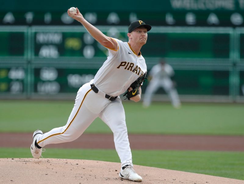 Sep 26, 2024; Pittsburgh, Pennsylvania, USA; Pittsburgh Pirates starting pitcher Mitch Keller (23) delivers a pitch  against the Milwaukee Brewers during the first inning at PNC Park. Mandatory Credit: Charles LeClaire-Imagn Images