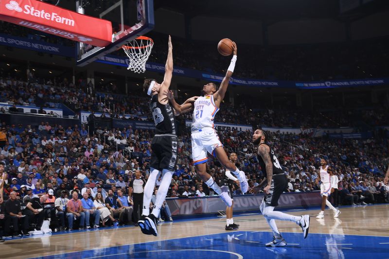 OKLAHOMA CITY, OK - OCTOBER 30: Aaron Wiggins #21 of the Oklahoma City Thunder drives to the basket during the game against the San Antonio Spurs on October 30, 2024 at Paycom Center in Oklahoma City, Oklahoma. NOTE TO USER: User expressly acknowledges and agrees that, by downloading and or using this photograph, User is consenting to the terms and conditions of the Getty Images License Agreement. Mandatory Copyright Notice: Copyright 2024 NBAE (Photo by Brian Babineau/NBAE via Getty Images)