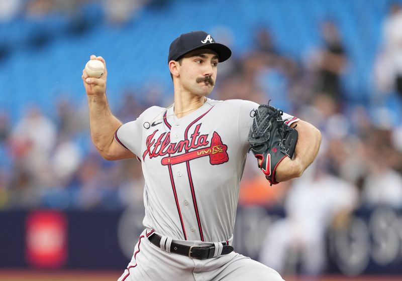 May 12, 2023; Toronto, Ontario, CAN; Atlanta Braves starting pitcher Spencer Strider (99) throws a pitch against the Toronto Blue Jays during the first inning at Rogers Centre. Mandatory Credit: Nick Turchiaro-USA TODAY Sports