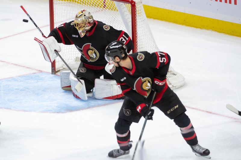 Feb 22, 2024; Ottawa, Ontario, CAN; Ottawa Senators  goalie Anton Forsberg (31) makes a save in the third period against the Dallas Stars at the Canadian Tire Centre. Mandatory Credit: Marc DesRosiers-USA TODAY Sports