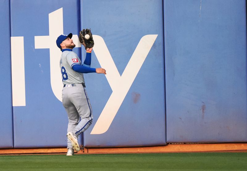 Jun 19, 2024; Oakland, California, USA; Kansas City Royals center fielder Kyle Isbel (28) catches the ball against the Oakland Athletics during the first inning at Oakland-Alameda County Coliseum. Mandatory Credit: Kelley L Cox-USA TODAY Sports