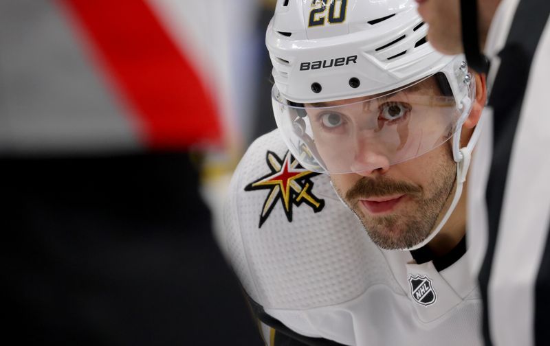 Mar 2, 2024; Buffalo, New York, USA;  Vegas Golden Knights center Chandler Stephenson (20) waits for the face-off during the first period against the Buffalo Sabres at KeyBank Center. Mandatory Credit: Timothy T. Ludwig-USA TODAY Sports