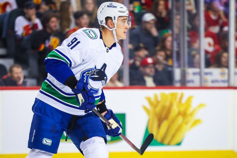 Dec 2, 2023; Calgary, Alberta, CAN; Vancouver Canucks defenseman Nikita Zadorov (91) skates against the Calgary Flames during the second period at Scotiabank Saddledome. Mandatory Credit: Sergei Belski-USA TODAY Sports