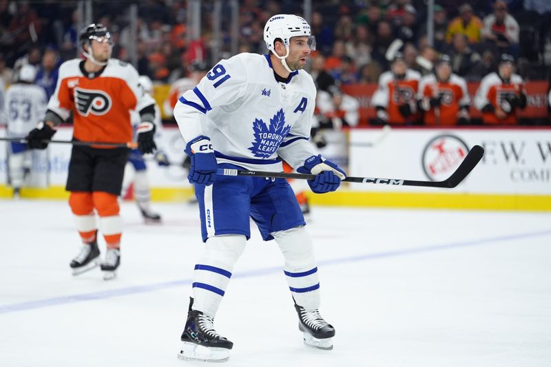 Nov 1, 2025; Philadelphia, Pennsylvania, USA; Toronto Maple Leafs center John Tavares (91) in action against the Philadelphia Flyers in the first period at Xfinity Mobile Arena. Mandatory Credit: Kyle Ross-Imagn Images