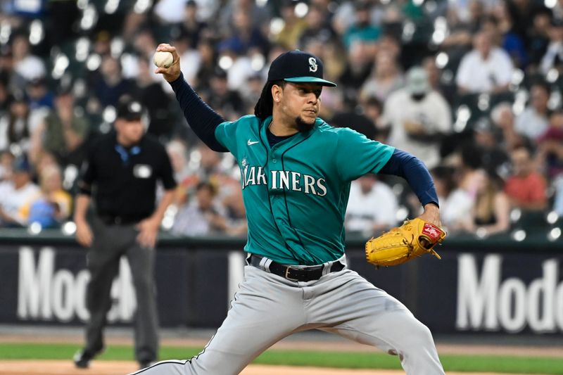 Aug 21, 2023; Chicago, Illinois, USA;   Seattle Mariners starting pitcher Luis Castillo (58) delvers against the Chicago White Sox during the first inning at Guaranteed Rate Field. Mandatory Credit: Matt Marton-USA TODAY Sports