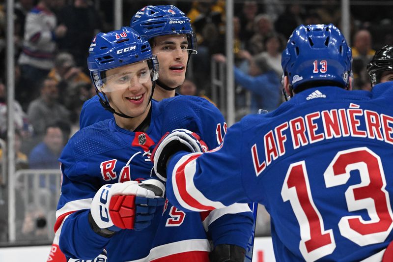 Mar 21, 2024; Boston, Massachusetts, USA; New York Rangers left wing Artemi Panarin (10) celebrates with New York Rangers left wing Alexis Lafreniere (13) after scoring a goal against the Boston Bruins during the second period at the TD Garden. Mandatory Credit: Brian Fluharty-USA TODAY Sports