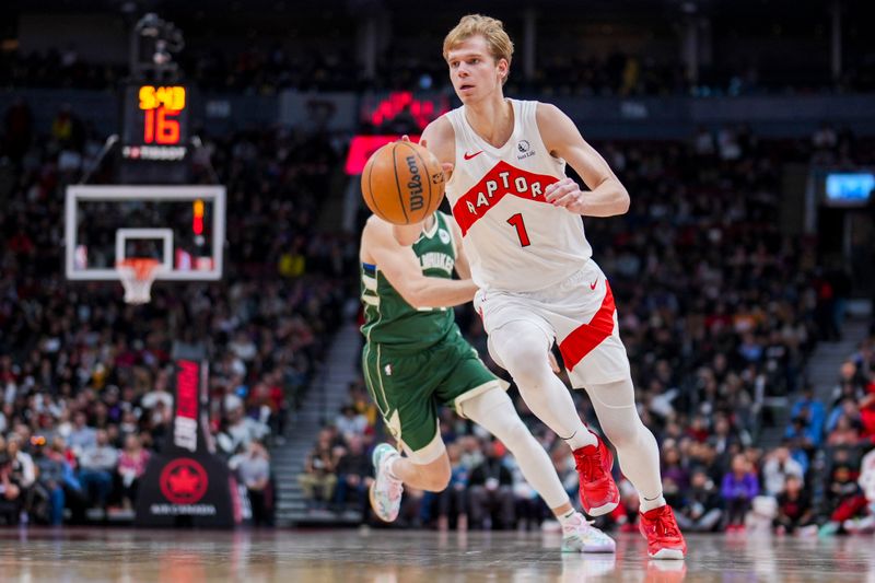 TORONTO, ON - JANUARY 6: Gradey Dick #1 of the Toronto Raptors dribbles the ball against the Milwaukee Bucks during the second half at the Scotiabank Arena on January 6, 2025 in Toronto, Ontario, Canada. NOTE TO USER: User expressly acknowledges and agrees that, by downloading and/or using this Photograph, user is consenting to the terms and conditions of the Getty Images License Agreement. (Photo by Kevin Sousa/Getty Images)