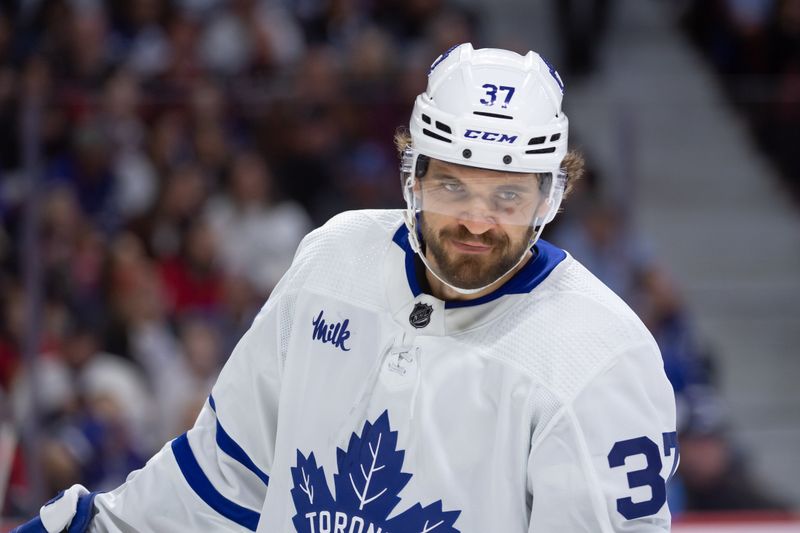 Feb 10, 2024; Ottawa, Ontario, CAN; Toronto Maple Leafs defenseman Timothy Liljegren (37) skates in the first period agains the Ottawa Senators at the Canadian Tire Centre. Mandatory Credit: Marc DesRosiers-USA TODAY Sports