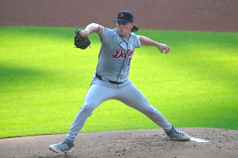 Jul 23, 2024; Cleveland, Ohio, USA; Detroit Tigers relief pitcher Tyler Holton (87) delivers a pitch in the first inning against the Cleveland Guardians at Progressive Field. Mandatory Credit: David Richard-USA TODAY Sports