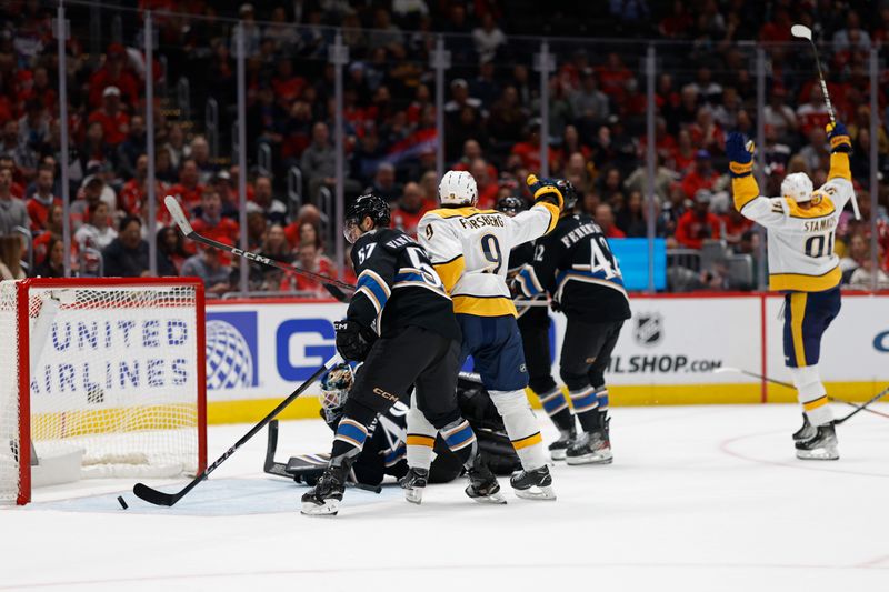 Nov 6, 2024; Washington, District of Columbia, USA; Nashville Predators center Steven Stamkos (91) celebrates after scoring a goal on Washington Capitals goaltender Logan Thompson (48) in the second period at Capital One Arena. Mandatory Credit: Geoff Burke-Imagn Images