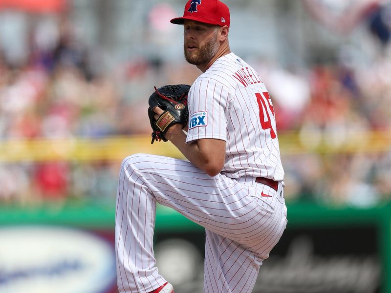 Mar 4, 2025; Clearwater, Florida, USA; Philadelphia Phillies pitcher Zack Wheeler (45) throws a pitch against the New York Yankees in the second inning during spring training at BayCare Ballpark. Mandatory Credit: Nathan Ray Seebeck-Imagn Images