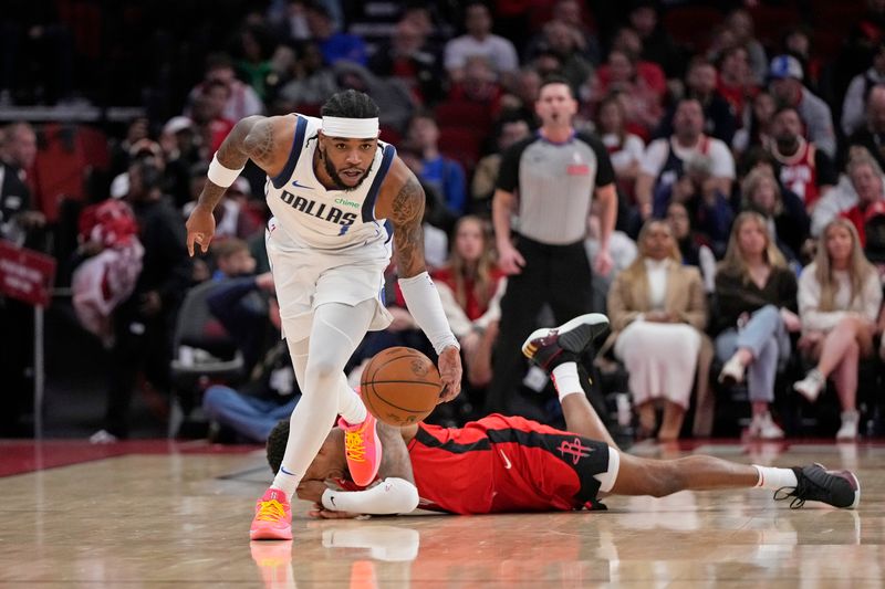 HOUSTON, TX - JANUARY 1: Jaden Hardy #1 of the Dallas Mavericks dribbles the ball during the game against the Houston Rockets  on January 1, 2025 at the Toyota Center in Houston, Texas. NOTE TO USER: User expressly acknowledges and agrees that, by downloading and or using this photograph, User is consenting to the terms and conditions of the Getty Images License Agreement. Mandatory Copyright Notice: Copyright 2025 NBAE (Photo by Kevin M.Cox/NBAE via Getty Images)