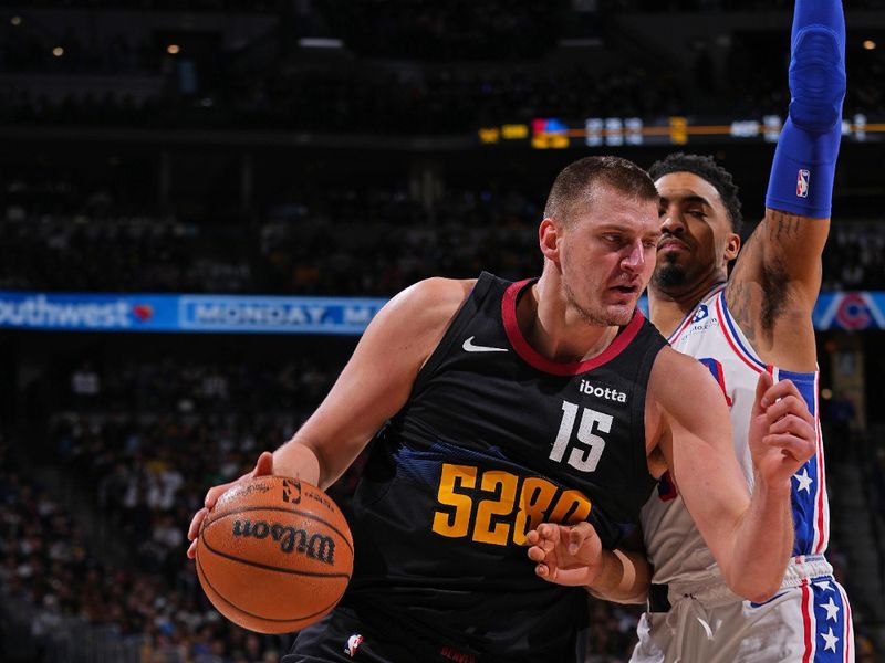 DENVER, CO - JANUARY 27: Nikola Jokic #15 of the Denver Nuggets drives to the basket during the game against the Philadelphia 76ers on January 27, 2024 at the Ball Arena in Denver, Colorado. NOTE TO USER: User expressly acknowledges and agrees that, by downloading and/or using this Photograph, user is consenting to the terms and conditions of the Getty Images License Agreement. Mandatory Copyright Notice: Copyright 2024 NBAE (Photo by Bart Young/NBAE via Getty Images)