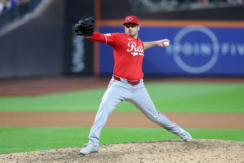 Sep 6, 2024; New York City, New York, USA; Cincinnati Reds relief pitcher Justin Wilson (32) pitches against the New York Mets during the tenth inning at Citi Field. Mandatory Credit: Brad Penner-Imagn Images