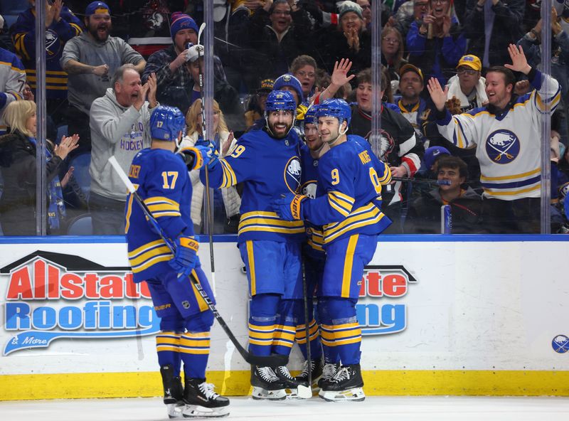 Jan 6, 2026; Buffalo, New York, USA;  Buffalo Sabres right wing Alex Tuch (89) celebrates his goal with teammates during the second period against the Vancouver Canucks at KeyBank Center. Mandatory Credit: Timothy T. Ludwig-Imagn Images