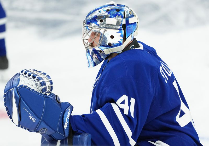 Nov 9, 2024; Toronto, Ontario, CAN; Toronto Maple Leafs goaltender Anthony Stolarz (41) stretches during the warmup before a game against the Montreal Canadiens at Scotiabank Arena. M andatory Credit: Nick Turchiaro-Imagn Images