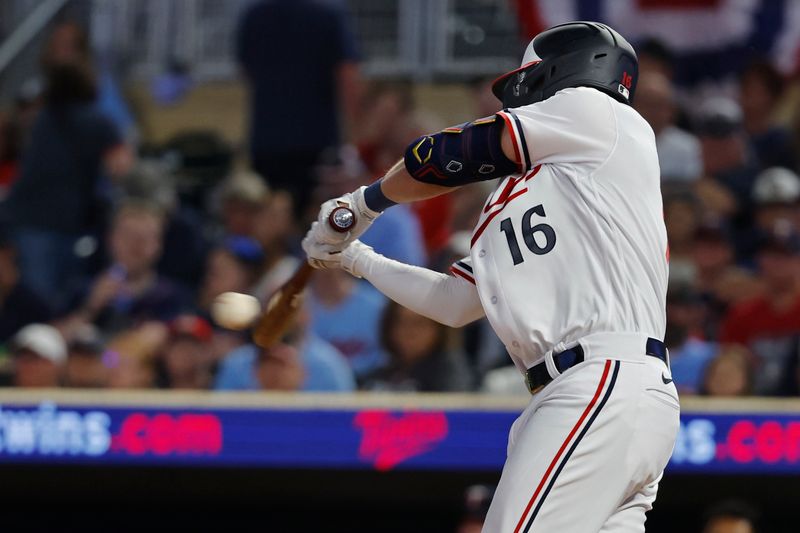 Aug 5, 2023; Minneapolis, Minnesota, USA; Minnesota Twins right fielder Jordan Luplow (16) hits an RBI single against the Arizona Diamondbacks in the eighth inning at Target Field. Mandatory Credit: Bruce Kluckhohn-USA TODAY Sports