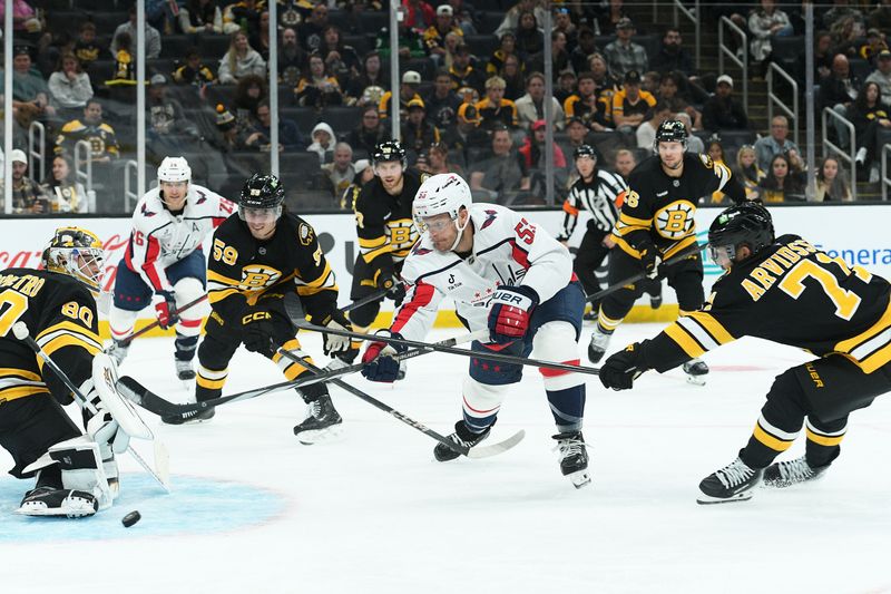 Sep 21, 2025; Boston, Massachusetts, USA; Washington Capitals forward Henrik Rybinsk (58) shoots the puck on Boston Bruins goaltender Michael DiPietro (80) during the second period at TD Garden. Mandatory Credit: Bob DeChiara-Imagn Images