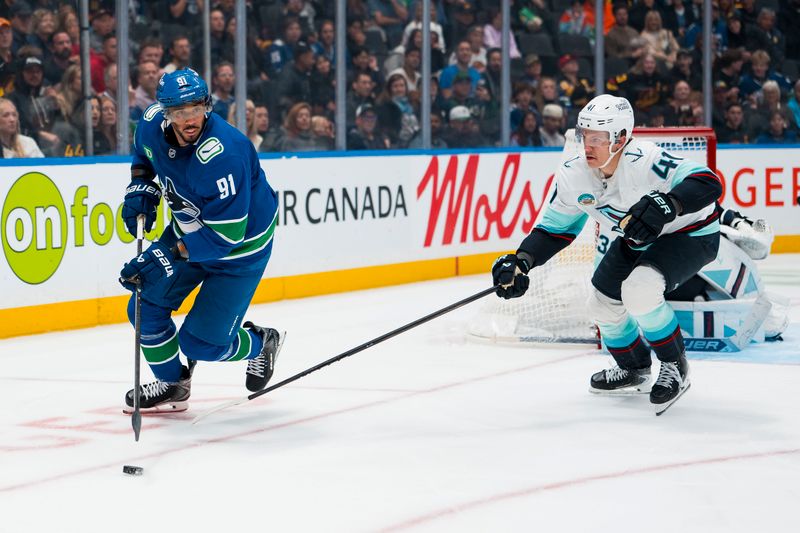 Sep 26, 2025; Vancouver, British Columbia, CAN; Seattle Kraken defenseman Ryker Evans (41) during a stop in play against Vancouver Canucks forward Evander Kane (91) in the third period at Rogers Arena. Mandatory Credit: Bob Frid-Imagn Images