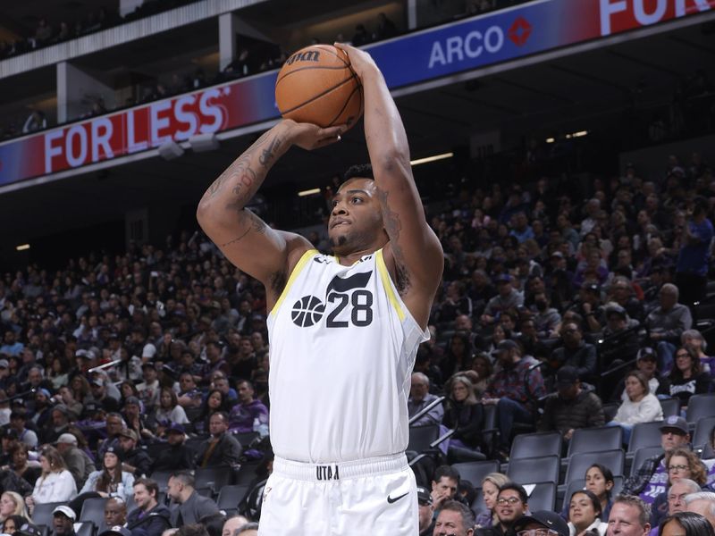 SACRAMENTO, CA - DECEMBER 8: Brice Sensabaugh #28 of the Utah Jazz shoots a three point basket during the game against the Sacramento Kings on December 8, 2024 at Golden 1 Center in Sacramento, California. NOTE TO USER: User expressly acknowledges and agrees that, by downloading and or using this Photograph, user is consenting to the terms and conditions of the Getty Images License Agreement. Mandatory Copyright Notice: Copyright 2024 NBAE (Photo by Rocky Widner/NBAE via Getty Images)