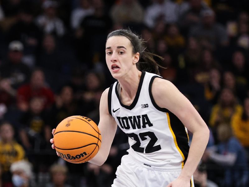 Mar 5, 2023; Minneapolis, MINN, USA; Iowa Hawkeyes guard Caitlin Clark (22) dribbles against the Ohio State Buckeyes during the first half at Target Center. Mandatory Credit: Matt Krohn-USA TODAY Sports