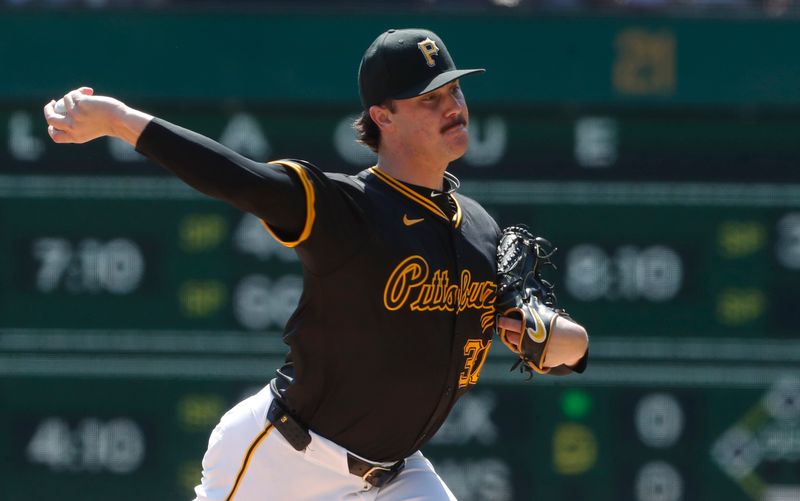 Aug 28, 2024; Pittsburgh, Pennsylvania, USA;  Pittsburgh Pirates starting pitcher Paul Skenes (30) delivers a pitch against the Chicago Cubs during the first inning at PNC Park. Mandatory Credit: Charles LeClaire-USA TODAY Sports