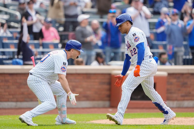 Jun 1, 2025; New York City, New York, USA; New York Mets first baseman Pete Alonso (20) congratulates New York Mets right fielder Juan Soto (22) for hitting a home run against the Colorado Rockies during the eighth inning at Citi Field. Mandatory Credit: Gregory Fisher-Imagn Images