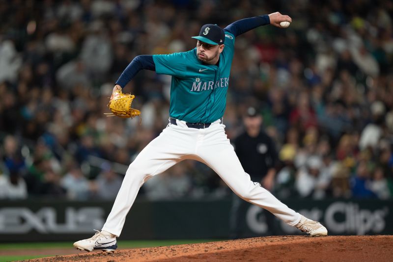 Sep 28, 2024; Seattle, Washington, USA; Seattle Mariners reliever Tayler Saucedo (60) delivers a pitch during the sixth inning against the Oakland Athletics at T-Mobile Park. Mandatory Credit: Stephen Brashear-Imagn Images