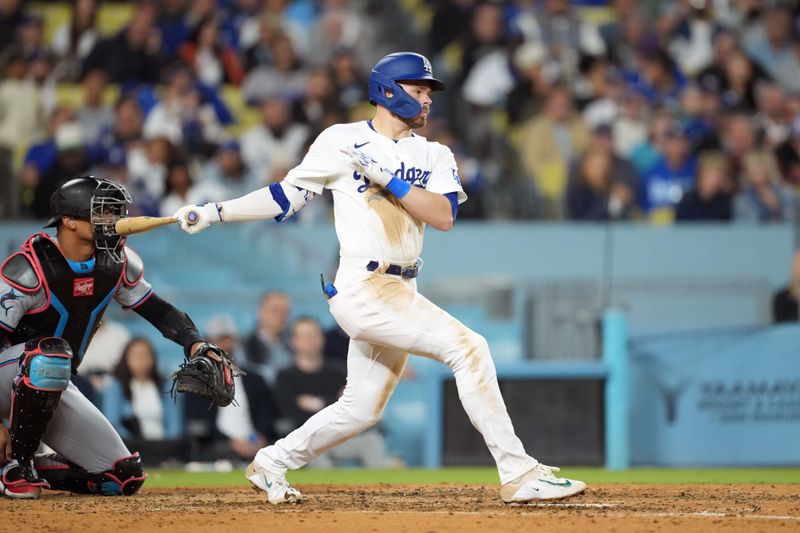 May 7, 2024; Los Angeles, California, USA; Los Angeles Dodgers second baseman Gavin Lux (9) bats against the Miami Marlins at Dodger Stadium. Mandatory Credit: Kirby Lee-USA TODAY Sports