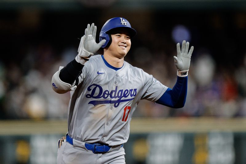 Sep 27, 2024; Denver, Colorado, USA; Los Angeles Dodgers designated hitter Shohei Ohtani (17) gestures as he rounds the bases on a three run home run in the sixth inning against the Colorado Rockies at Coors Field. Mandatory Credit: Isaiah J. Downing-Imagn Images