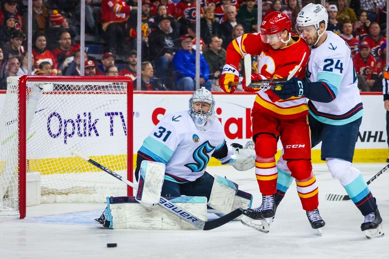 Mar 4, 2024; Calgary, Alberta, CAN; Seattle Kraken goaltender Philipp Grubauer (31) guards his net against the Calgary Flames during the second period at Scotiabank Saddledome. Mandatory Credit: Sergei Belski-USA TODAY Sports