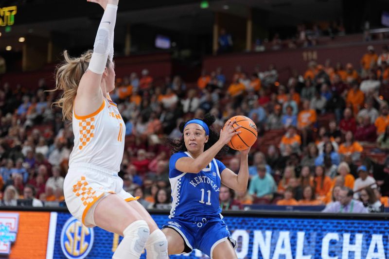 Mar 3, 2023; Greenville, SC, USA; Tennessee Lady Vols forward Karoline Striplin (11) guards against Kentucky Wildcats guard Jada Walker (11) in the first quarter at Bon Secours Wellness Arena. Mandatory Credit: David Yeazell-USA TODAY Sports