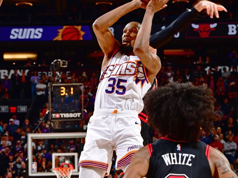 PHOENIX, AZ - JANUARY 22:  Kevin Durant #35 of the Phoenix Suns shoots the game winning shot during the game against the Chicago Bulls on January 22, 2024 at Footprint Center in Phoenix, Arizona. NOTE TO USER: User expressly acknowledges and agrees that, by downloading and or using this photograph, user is consenting to the terms and conditions of the Getty Images License Agreement. Mandatory Copyright Notice: Copyright 2024 NBAE (Photo by Barry Gossage/NBAE via Getty Images)