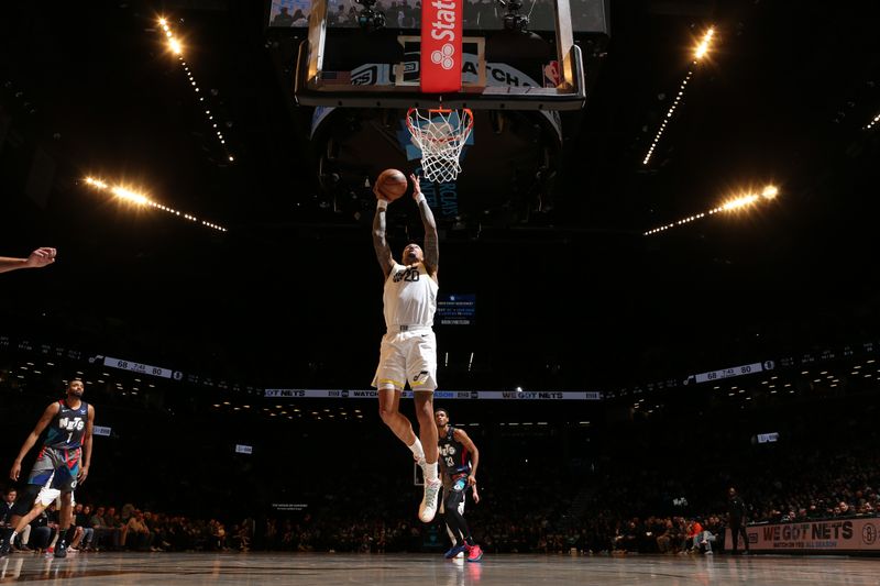 BROOKLYN, NY - JANUARY 29: John Collins #20 of the Utah Jazz drives to the basket during the game against the Brooklyn Nets on January 29, 2024 at Barclays Center in Brooklyn, New York. NOTE TO USER: User expressly acknowledges and agrees that, by downloading and or using this Photograph, user is consenting to the terms and conditions of the Getty Images License Agreement. Mandatory Copyright Notice: Copyright 2024 NBAE (Photo by Nathaniel S. Butler/NBAE via Getty Images)