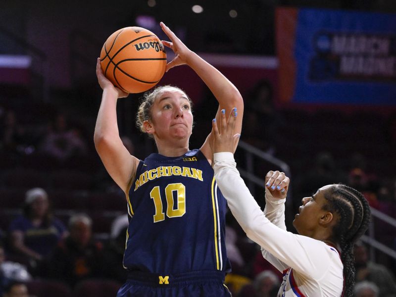 Jayhawks Overcome Wolverines in Overtime Thriller at Galen Center