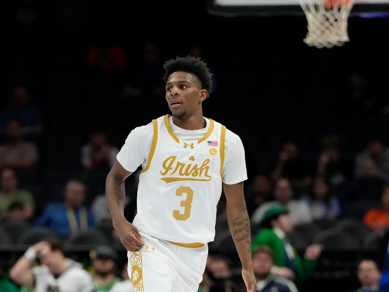 Mar 11, 2025; Charlotte, NC, USA; Notre Dame Fighting Irish guard Markus Burton (3) dribbles in the first half at Spectrum Center. Mandatory Credit: Bob Donnan-Imagn Images